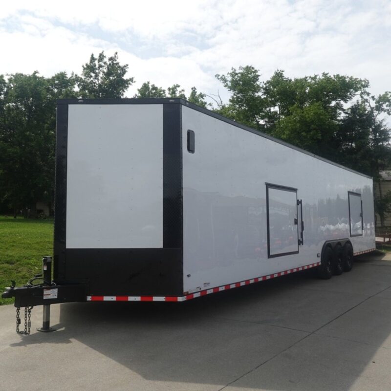 8.5X36 White With Black Out Enclosed Trailer With Escape Doors E Track Floor (3) 7K Axles 21K GVWR