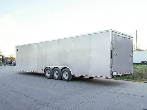 8.5x32 Silver Enclosed Car Hauler Trailer With Ramp and side door (3) 7K Axles 21k GVWR
